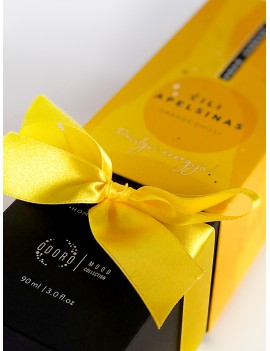 Wrapping the product with a bright yellow ribbon + scent spraying